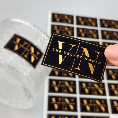 satın al High Quality Customized Embossed UV Gold Foil Printing Card Press Gold Art Paper Velvet Gold Stamping Label Sticker for Perfume & Party  online manufacture